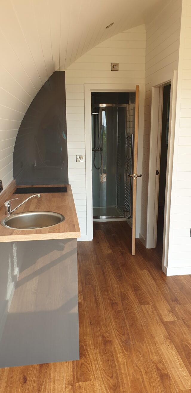 Deluxe pod showing layout kitchen bathroom bedroom